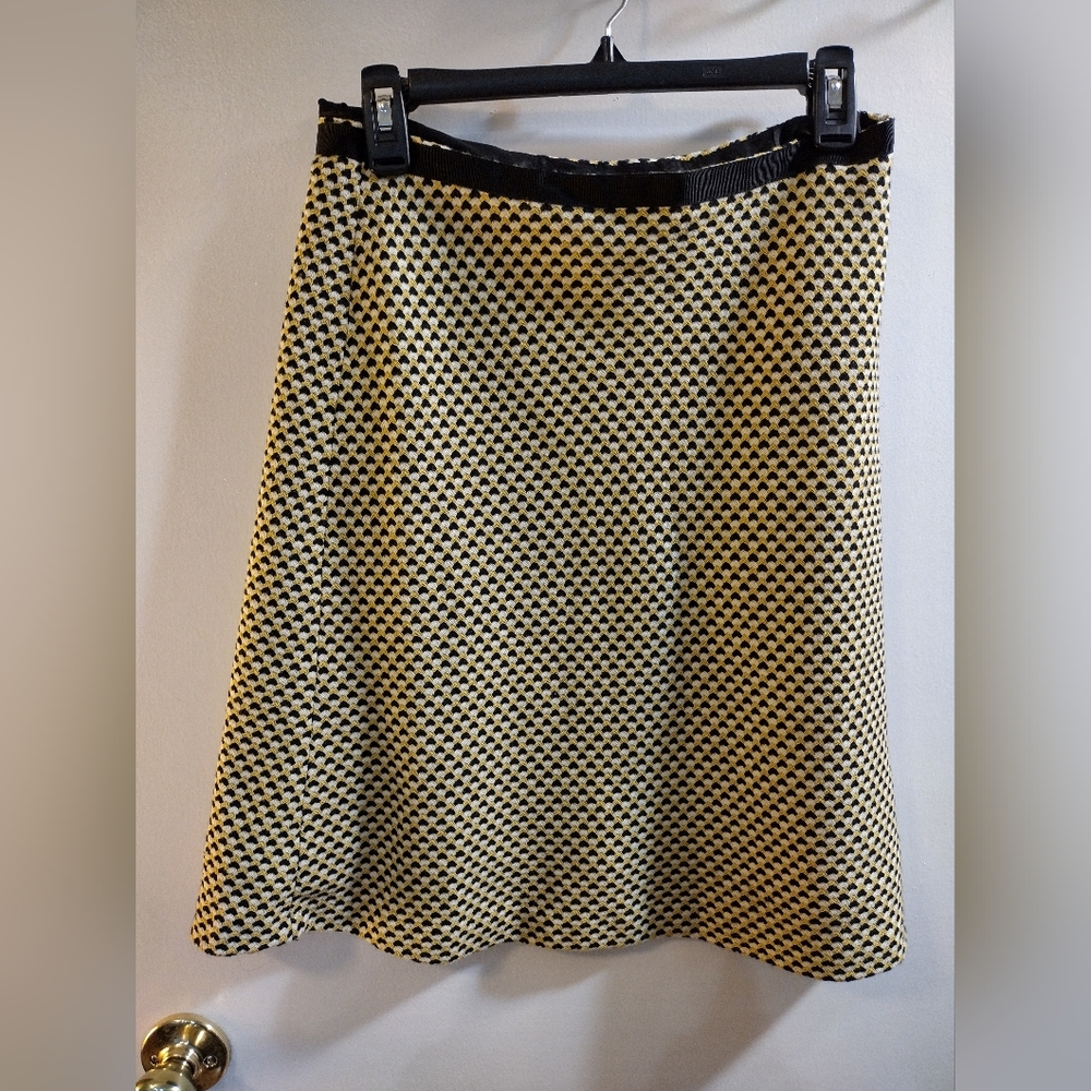 INC size 6 skirt in a yellow black and cream check design. Side zipper.